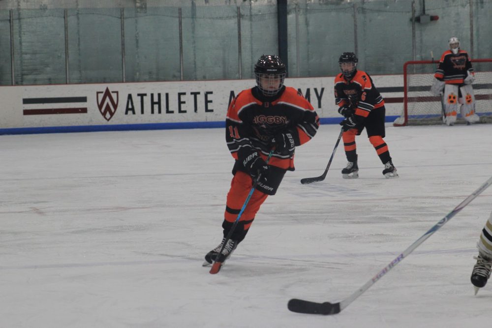 Bomber leads the rush up ice.