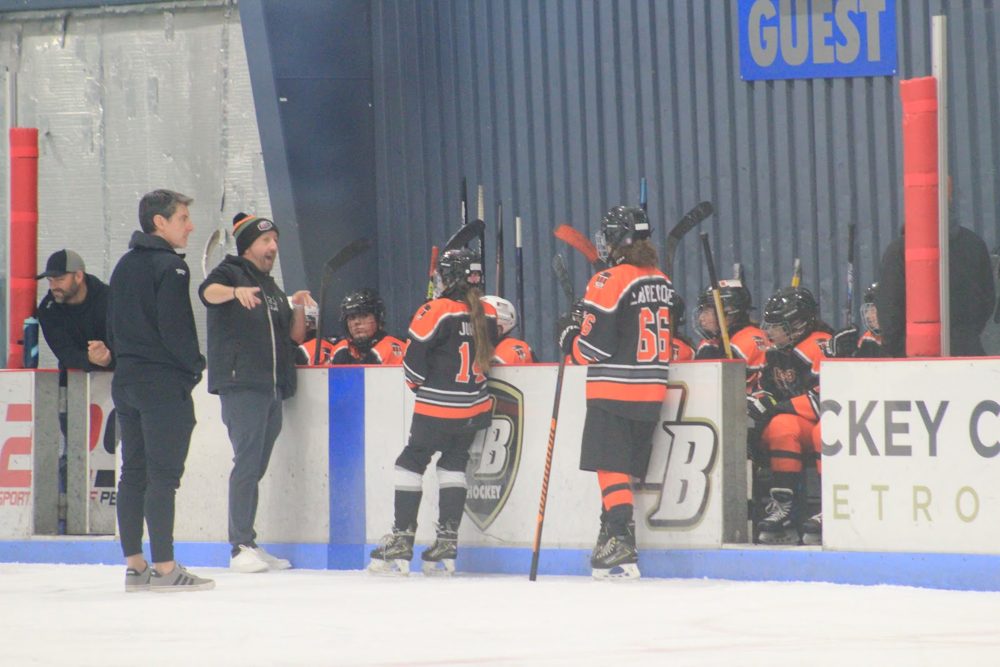The bench at HB, with Claire L. (#66) up front.
