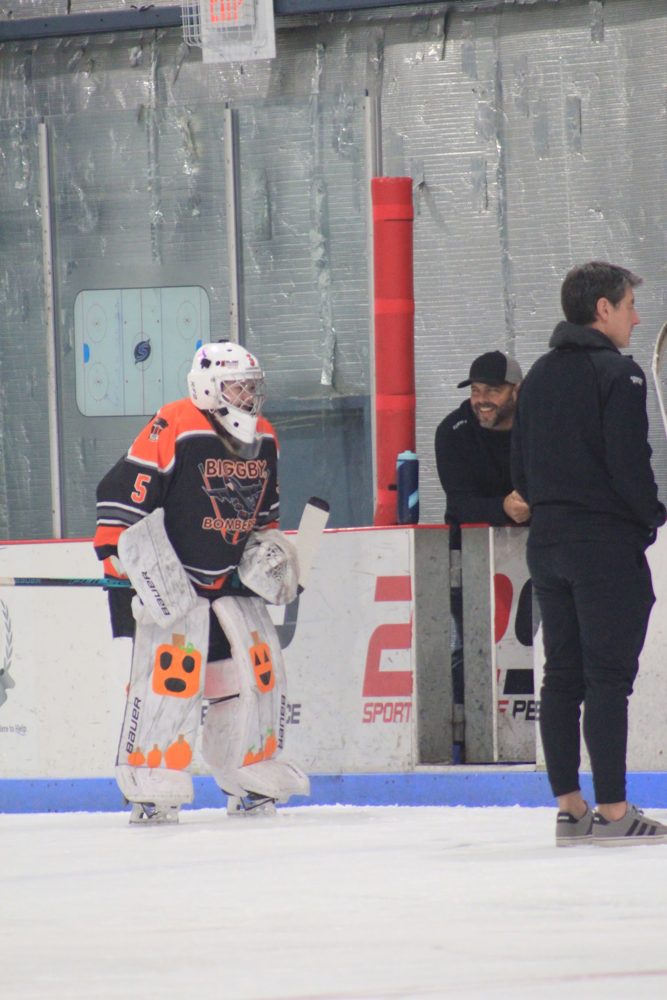 Our goalie, Makayla T. (#5), resets in the crease.