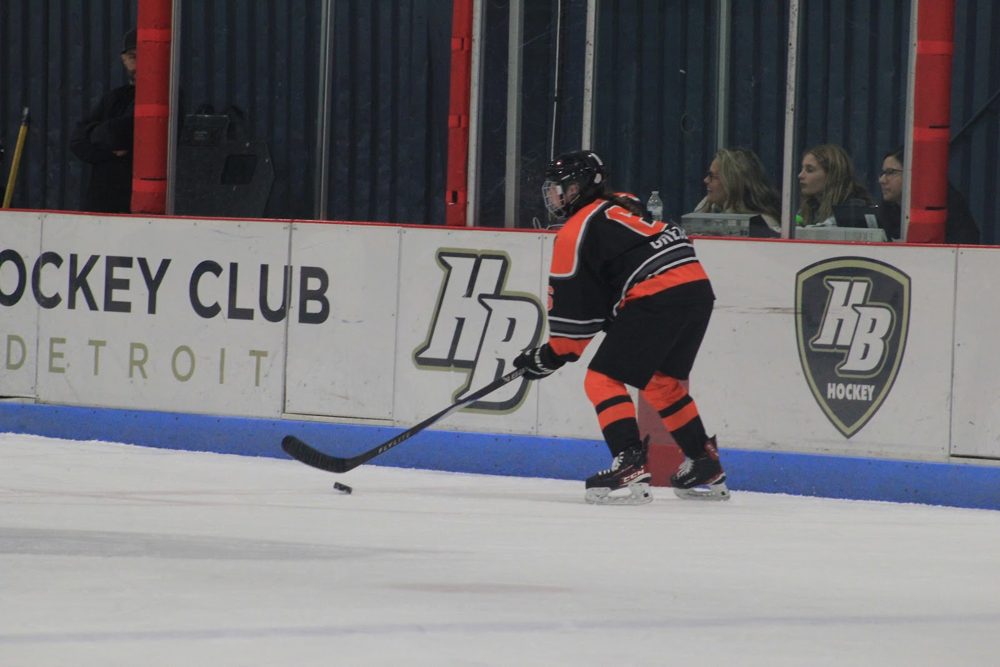 Bomber chases a loose puck at HB.