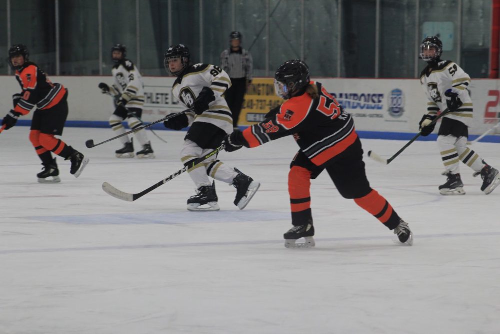 Bomber jumps on the loose puck.