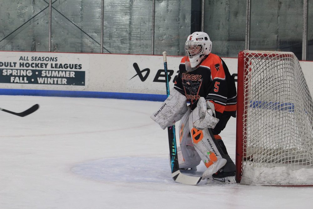 Makayla T. (#5) set in the crease, eyes on the shot.